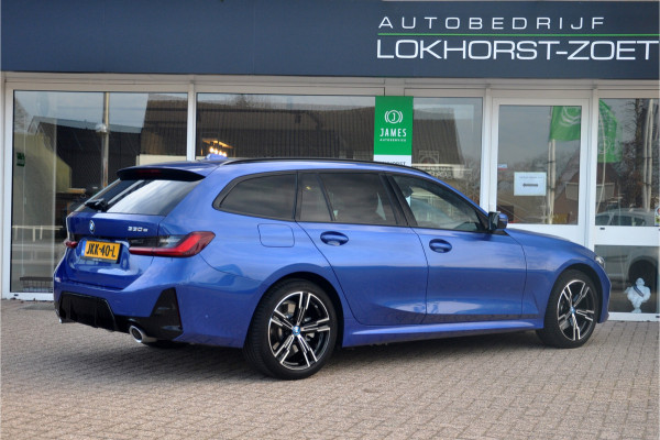 BMW 3 Serie Touring 330e | HUD | Trekhaak | Portimao Blue Metallic