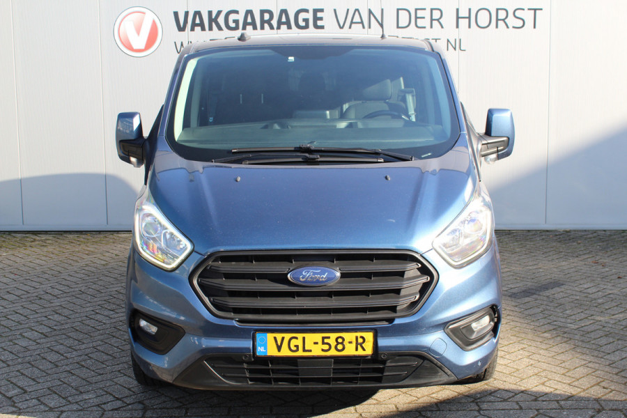 Ford Transit Custom 300 2.0-130pk TDCI L1H1 Trend Dubb. cabine. Trekgewicht 2.500kg ! Airco, stoel- spiegelverwarming, bijrijdersstoel, dubbele cabine, trekhaak, parkeersensoren v+a, navigatie, telefoonvoorb., metallic lak