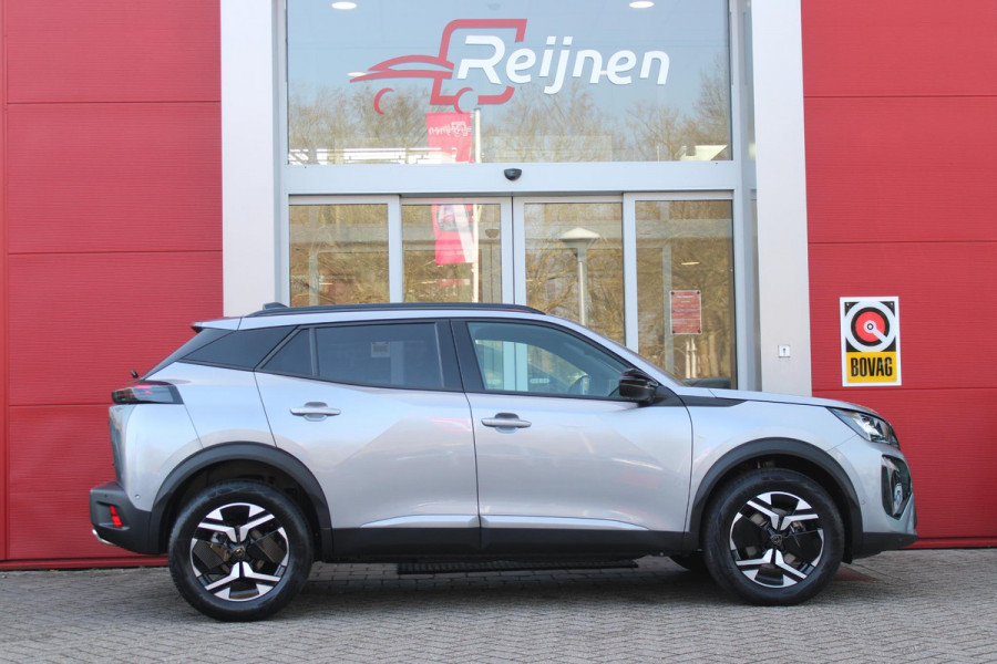 Peugeot 2008 1.2 Hybrid 145PK AUTOMAAT ALLURE | NIEUWE AUTO! | CAMERA VOOR + ACHTER | KEYLESS ENTRY/START | PARKEERSENSOREN VOOR + ACHTER | DODEHOEK DETECTIE | 17" LICHTMETALEN VELGEN | ADAPTIVE CRUISE CONTROL | CLIMATE CONTROL | STOEL VERWARMING | DRAADLOZE APPLE CARPLAY/ANDROID AUTO |