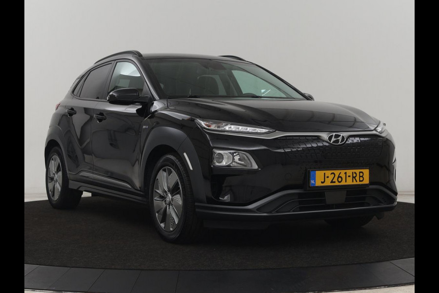Hyundai Kona EV Fashion 64 kWh | SOH 100% | 3 Fase | Head-Up | Camera | Adaptive cruise | Krell Audio | Wamtepomp | Carplay | Navigatie | Bluetooth
