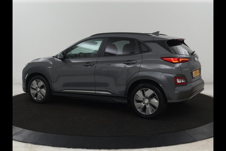 Hyundai Kona EV Premium 64 kWh | SOH 100% | 3 Fase | Stoelventilatie | Leder | Head-Up | Warmtepomp | Camera | Achterbankverwarming | Carplay | Navigatie | Adaptive cruise | Keyless | Parkeerhulp