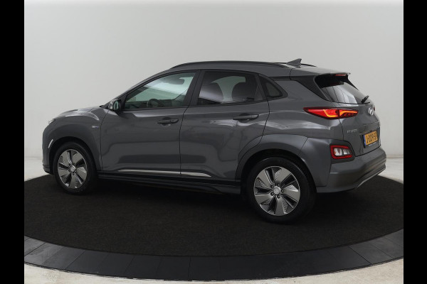 Hyundai Kona EV Premium 64 kWh | SOH 100% | 3 Fase | Stoelventilatie | Leder | Head-Up | Warmtepomp | Camera | Achterbankverwarming | Carplay | Navigatie | Adaptive cruise | Keyless | Parkeerhulp