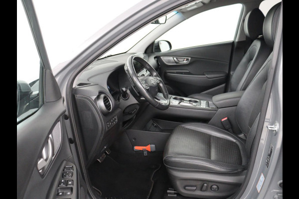 Hyundai Kona EV Premium 64 kWh | SOH 100% | 3 Fase | Stoelventilatie | Leder | Head-Up | Warmtepomp | Camera | Achterbankverwarming | Carplay | Navigatie | Adaptive cruise | Keyless | Parkeerhulp