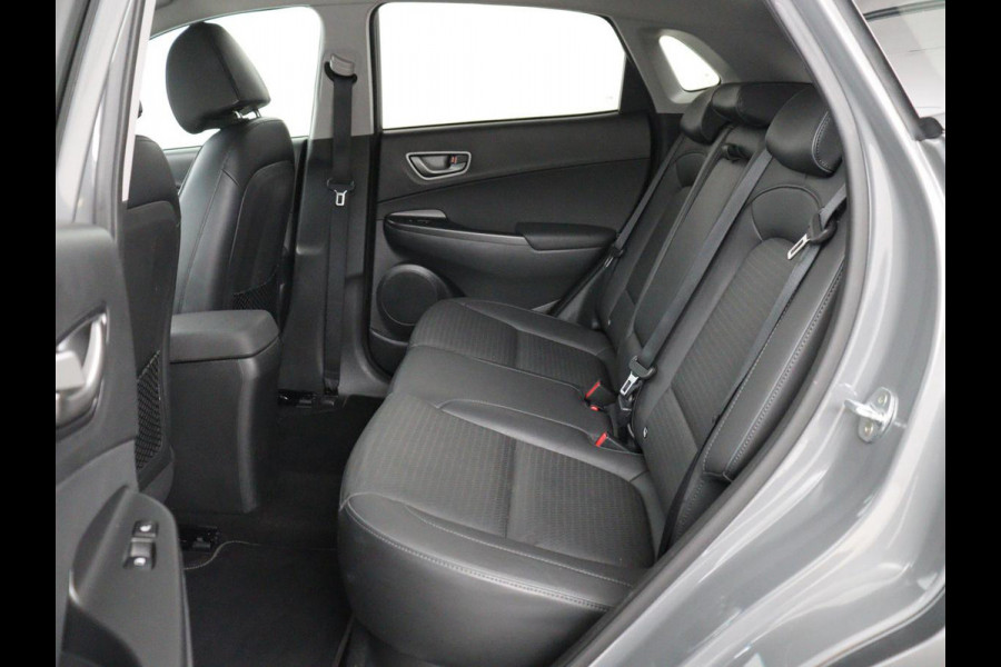 Hyundai Kona EV Premium 64 kWh | SOH 100% | 3 Fase | Stoelventilatie | Leder | Head-Up | Warmtepomp | Camera | Achterbankverwarming | Carplay | Navigatie | Adaptive cruise | Keyless | Parkeerhulp