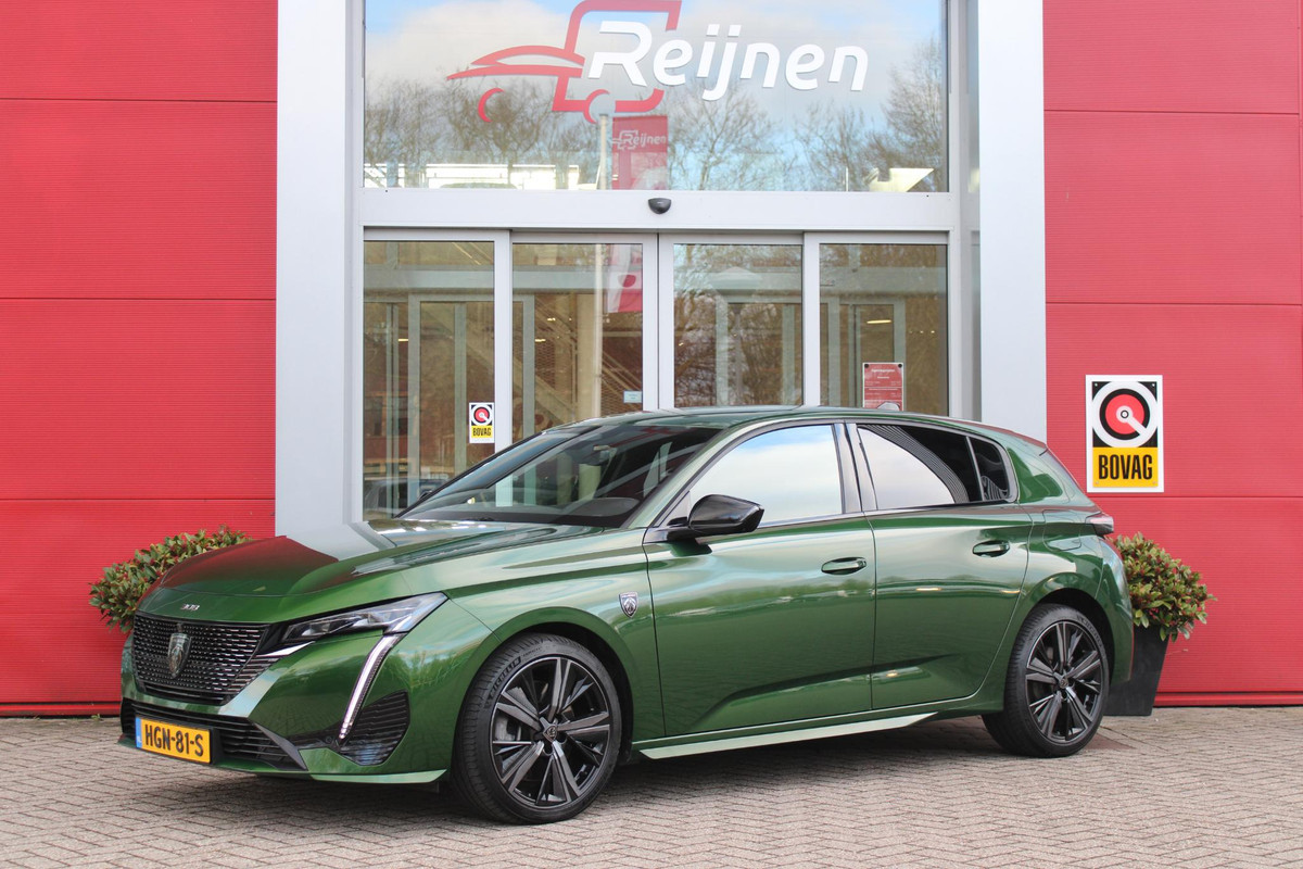 Peugeot 308 1.6 Plug-in Hybrid 225PK GT | ELEKTRISCH BEDIENBARE BESTUURDERSSTOEL MET GEHEUGENFUNCTIE | VOORSTOELEN MET VERWARMING EN MASSAGE FUNCTIE | 360° CAMERA | PARKEERSENSOREN VOOR + ACHTER | NAVIGATIE | DRAADLOZE APPLE CARPLAY/ANDROID AUTO | DAB+ RADIO | DODEHOEK DETECTIE | ADAPTIVE CRUISE CONTROL | KEYLESS ENTRY/START | 18" LICHTEMETALEN VELGEN |