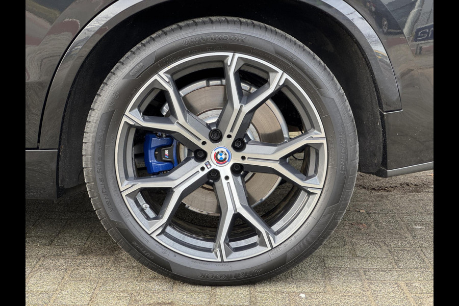 BMW X5 xDrive45e High Executive M Sport Pakket Automaat / Panoramadak / Active Steering / Trekhaak / Head-Up Display / Comfortstoelen / Laserlight / Driving Assistant Professional / 21 Inch / Luchtvering / Hifi / Craftedclarity / Shadow Line / M Sportremsysteem