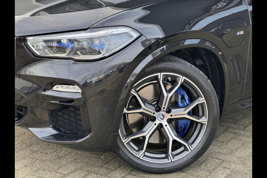 BMW X5 xDrive45e High Executive M Sport Pakket Automaat / Panoramadak / Active Steering / Trekhaak / Head-Up Display / Comfortstoelen / Laserlight / Driving Assistant Professional / 21 Inch / Luchtvering / Hifi / Craftedclarity / Shadow Line / M Sportremsysteem