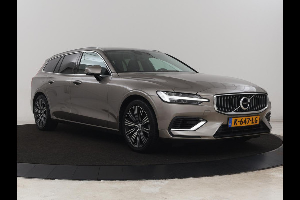Volvo V60 2.0 T6 Recharge AWD Inscription | Trekhaak | Stoelverwarming | Harman/Kardon | Leder | Camera | Adaptive cruise | Carplay | Keyless | Memory | Navigatie | Full LED | Stuurverwarming | PHEV | Plug in