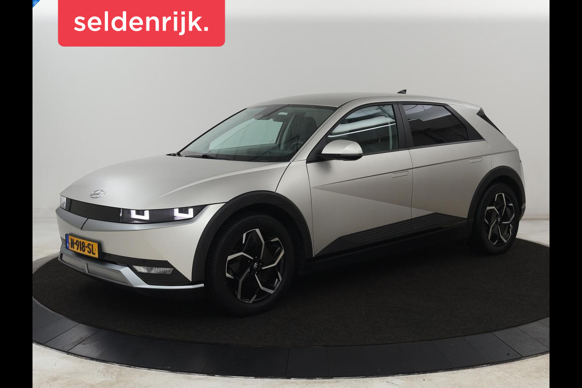 Hyundai IONIQ 5 Connect 58 kWh | SOH 100% | Stoelverwarming | Adaptive cruise | Bose Sound | Camera | Carplay | Half leder | Vehicle-to-load | Keyless | Navigatie | Full LED