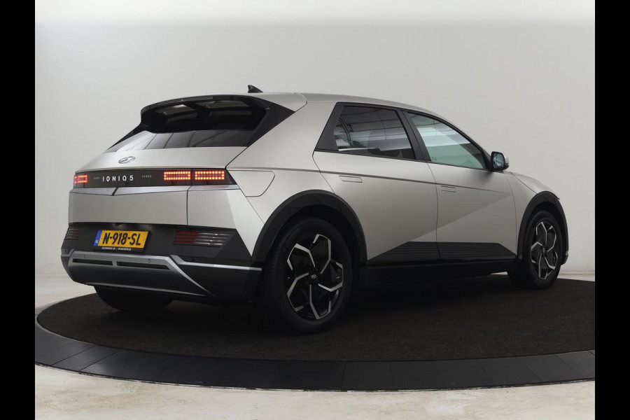 Hyundai IONIQ 5 Connect 58 kWh | SOH 100% | Stoelverwarming | Adaptive cruise | Bose Sound | Camera | Carplay | Half leder | Vehicle-to-load | Keyless | Navigatie | Full LED