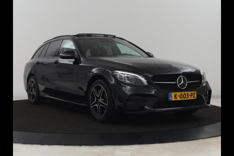 Mercedes-Benz C-Klasse 300e AMG Limited | Panoramadak | 360 Camera | Stoelverwarming | Trekhaak | Carplay | Leder/Alcantara | Sfeerverlichting | Navigatie | Cruise control | Park Assist |