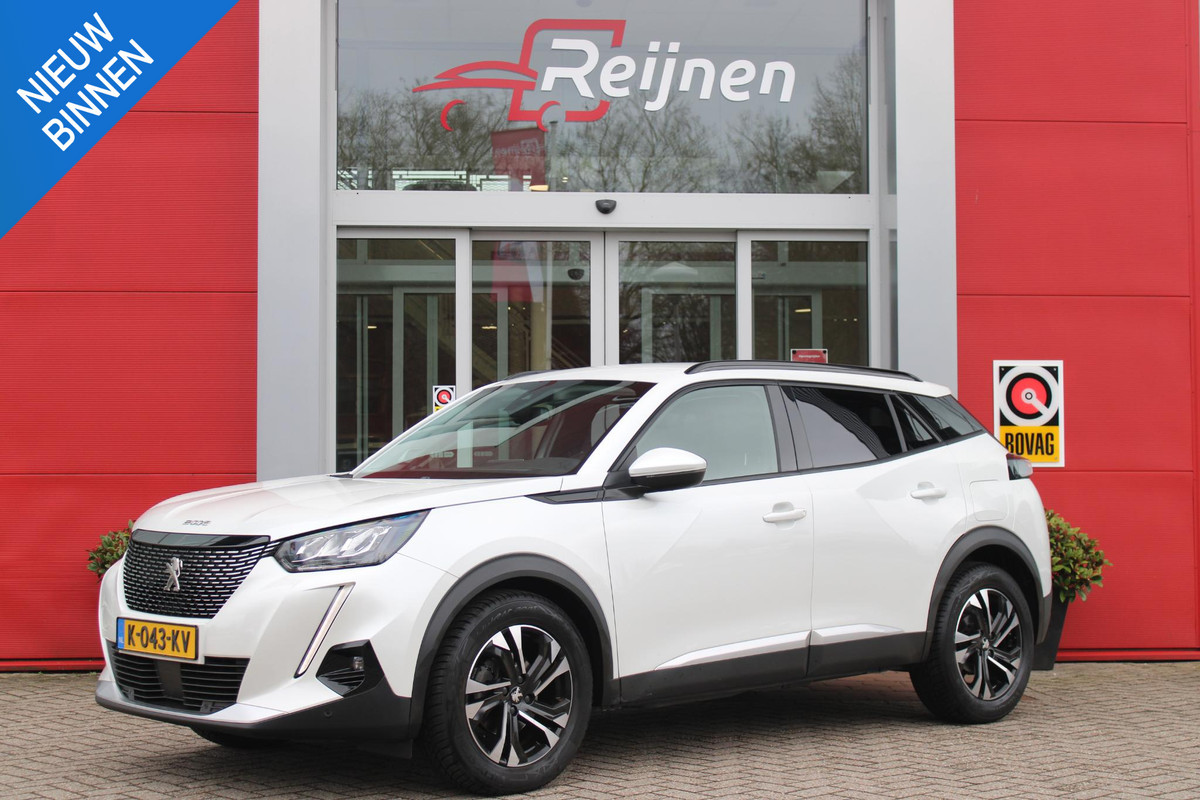 Peugeot 2008 1.2 100PK ALLURE PACK | TREKHAAK | NAVIGATIE | LED KOPLAMPEN | 3-D INSTRUMENTENPANEEL | KEYLESS ENTRY/START | ACHTERUITRIJ CAMERA | CLIMATE CONTROL | APPLE CARPLAY/ANDROID AUTO | CRUISE CONTROL | DAB+ RADIO | PARKEERSENSOREN VOOR + ACHTER |