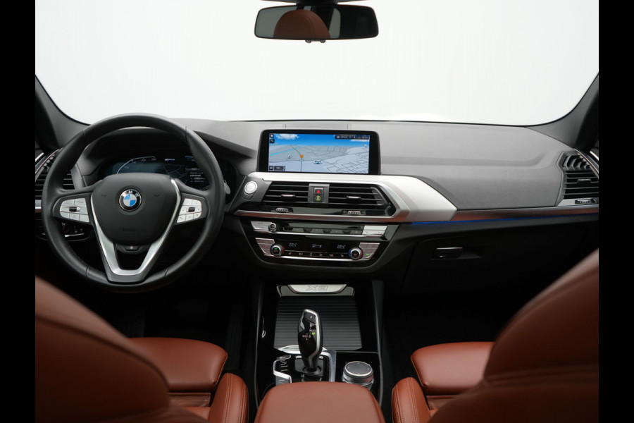 BMW X3 xDrive30e High Executive Plug In Hybrid 293pk PHEV | Panodak | Head Up | Camera | Lederen Sportstoelen & Stuur Verwarmd | Sfeerverlichting | Adaptive LED | Hifi Audio | Blis | Keyless | Navigatie | DAB |