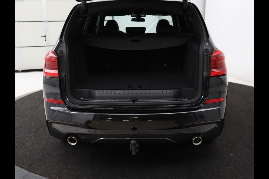 BMW X3 xDrive20i High Executive | M Sport | 1e eigenaar | Head-Up | Leder | Trekhaak | Stoelverwarming | Harman/Kardon | Camera | Keyless | Adaptive Drive | Sfeerverlichting | Full LED | Sportstoelen