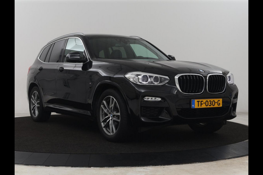 BMW X3 xDrive20i High Executive | M Sport | 1e eigenaar | Head-Up | Leder | Trekhaak | Stoelverwarming | Harman/Kardon | Camera | Keyless | Adaptive Drive | Sfeerverlichting | Full LED | Sportstoelen