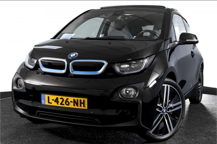 BMW i3 Basis 94Ah 33 kWh | S/k-panodak | Harman/Kardon | Dig. Cockpit | Adapt. cruise | Stoelverw. | PDC | Camera | NAV | ECC | LM 20" |
