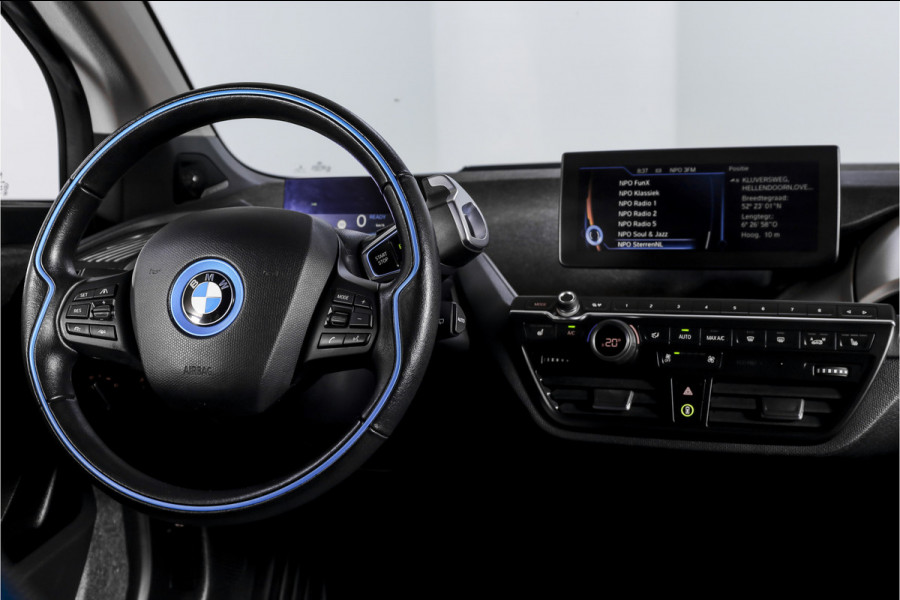 BMW i3 Basis 94Ah 33 kWh | S/k-panodak | Harman/Kardon | Dig. Cockpit | Adapt. cruise | Stoelverw. | PDC | Camera | NAV | ECC | LM 20" |