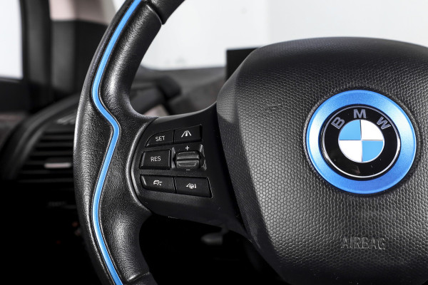 BMW i3 Basis 94Ah 33 kWh | S/k-panodak | Harman/Kardon | Dig. Cockpit | Adapt. cruise | Stoelverw. | PDC | Camera | NAV | ECC | LM 20" |