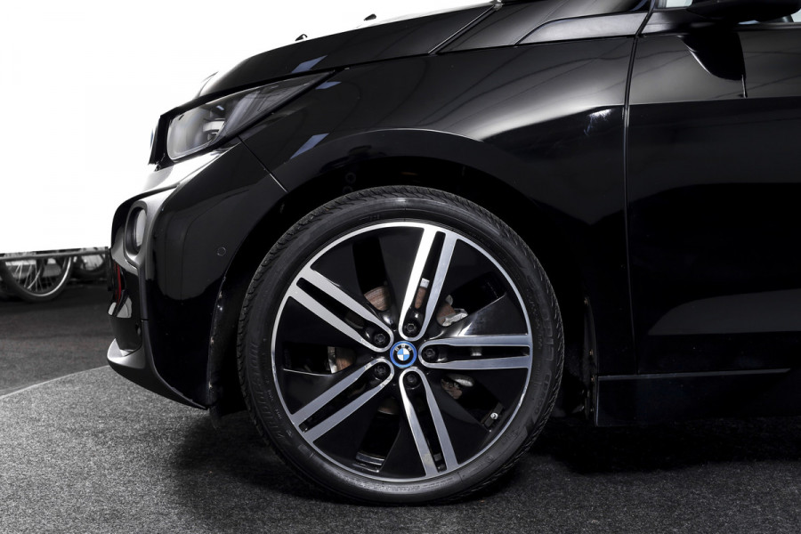 BMW i3 Basis 94Ah 33 kWh | S/k-panodak | Harman/Kardon | Dig. Cockpit | Adapt. cruise | Stoelverw. | PDC | Camera | NAV | ECC | LM 20" |