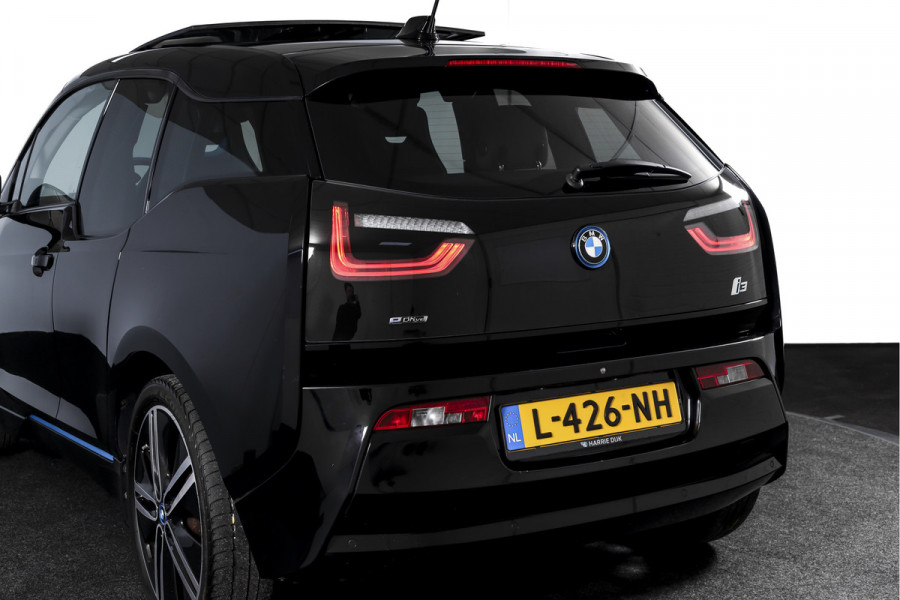 BMW i3 Basis 94Ah 33 kWh | S/k-panodak | Harman/Kardon | Dig. Cockpit | Adapt. cruise | Stoelverw. | PDC | Camera | NAV | ECC | LM 20" |