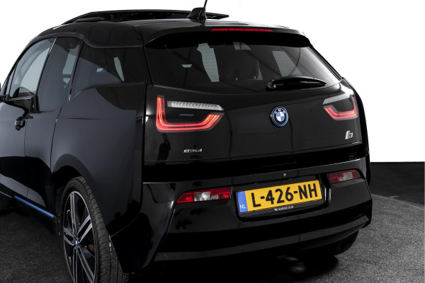 BMW i3 Basis 94Ah 33 kWh | S/k-panodak | Harman/Kardon | Dig. Cockpit | Adapt. cruise | Stoelverw. | PDC | Camera | NAV | ECC | LM 20" |