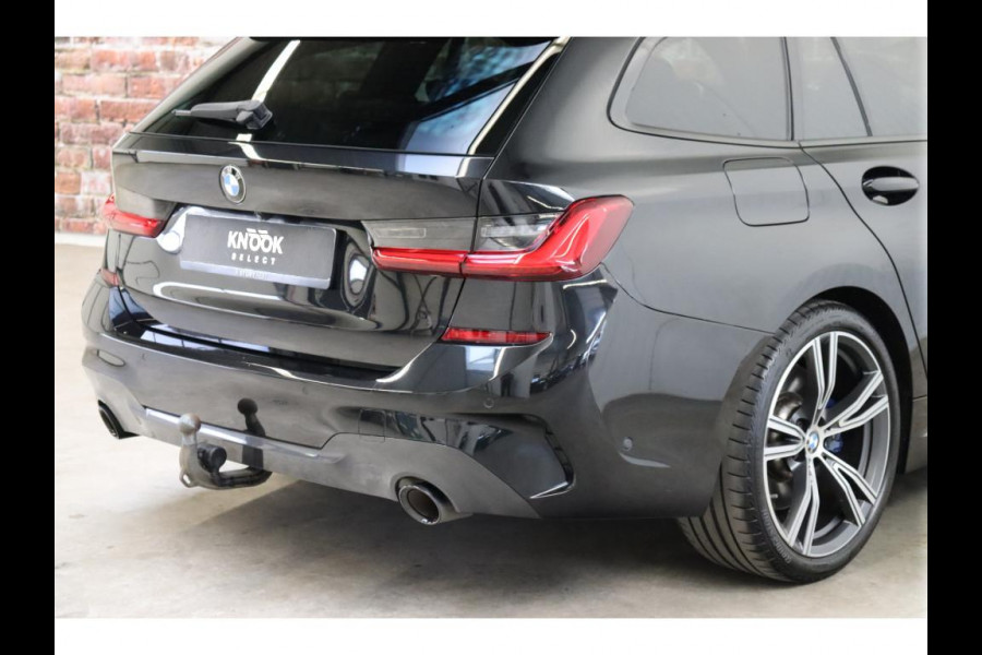 BMW 3 Serie Touring 330i xDrive High Executive M Sport / Panoramadak / Head-Up Display / Trekhaak / Leder / Apple CarPlay / Harman Kardon / 19 Inch /  Laserlicht / M Sportremsysteem / Adaptief M-onderstel