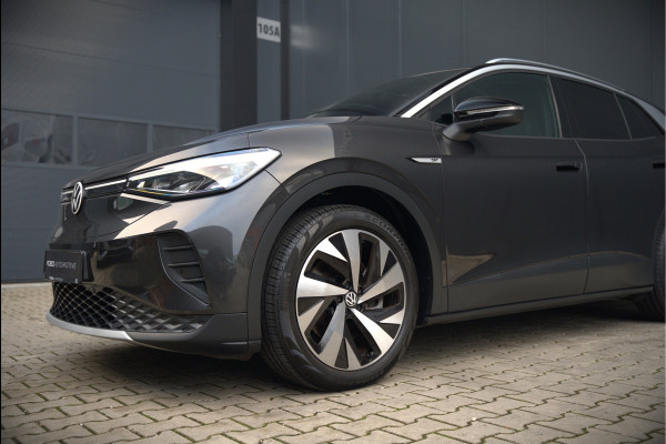 Volkswagen ID.4 First 77 kWh | Stoelverwarming | Stuurverwarming | Trekhaak | Adaptive Cruise Control | Navigatie | Apple Carplay | Keyless | Camera | Parkersensoren |
