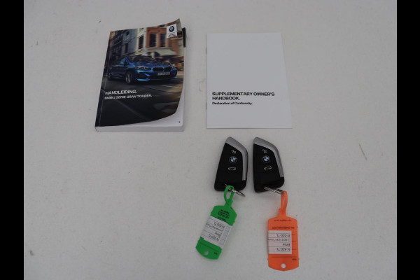 BMW 2 Serie Gran Tourer 220i Business Edition Plus | Luxury Line | Leder | Head-Up | Stoelverwarming | Trekhaak | Camera | Carplay | Full LED | Keyless | Navigatie | Cruise control | Bluetooth