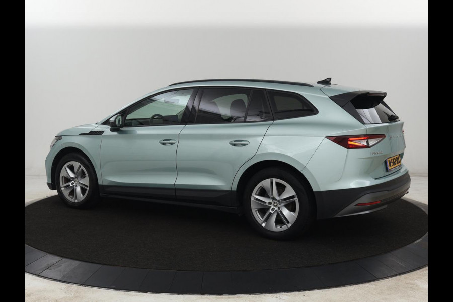 Škoda ENYAQ iV 60 | Warmtepomp | Stoelverwarming | Camera | Keyless | Carplay | Navigatie | Half leder | Full LED | Cruise control | Parkeerhulp | Sfeerverlichting