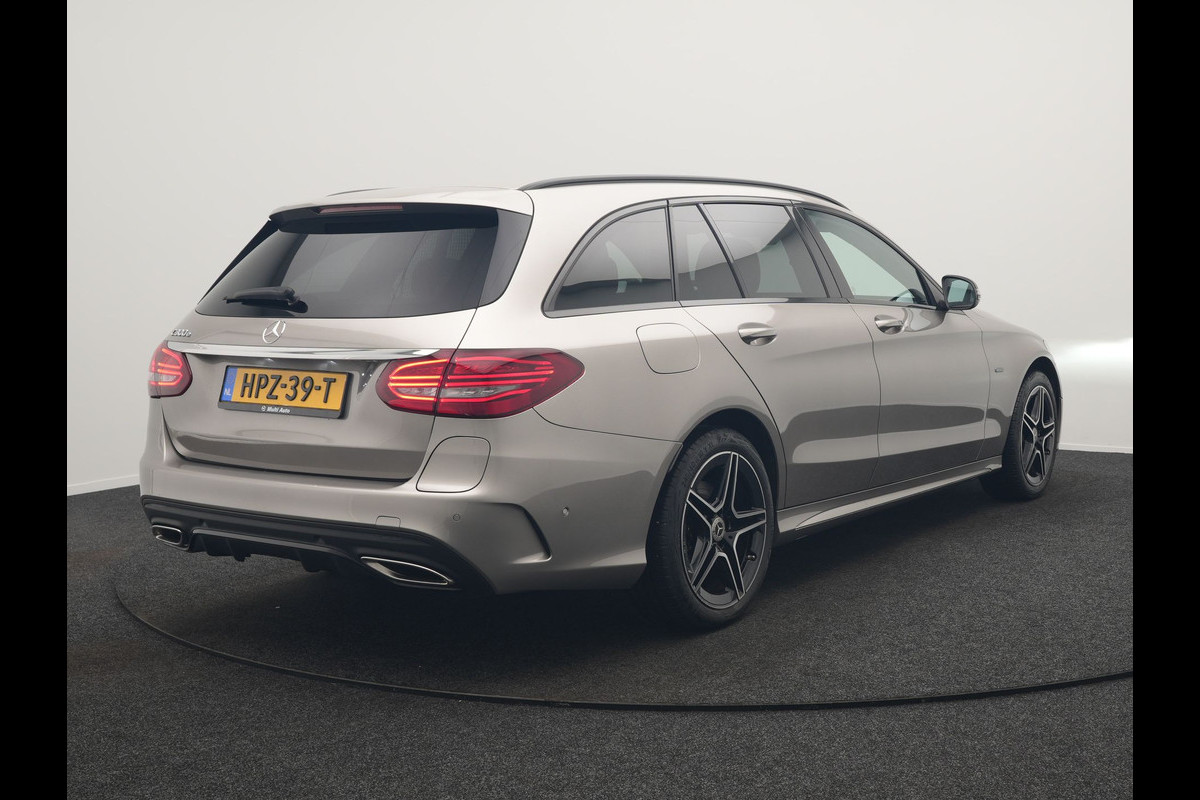 Mercedes-Benz C-Klasse Estate 300 e Business Solution AMG Plug In Hybrid 320pk PHEV | Trekhaak af Fabriek | Adaptive Cruise | Alcantara Sportstoelen Verwarmd | Apple Carplay | Camera | BLIS | 18"L.M |