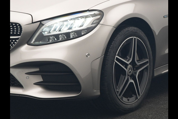 Mercedes-Benz C-Klasse Estate 300 e Business Solution AMG Plug In Hybrid 320pk PHEV | Trekhaak af Fabriek | Adaptive Cruise | Alcantara Sportstoelen Verwarmd | Apple Carplay | Camera | BLIS | 18"L.M |