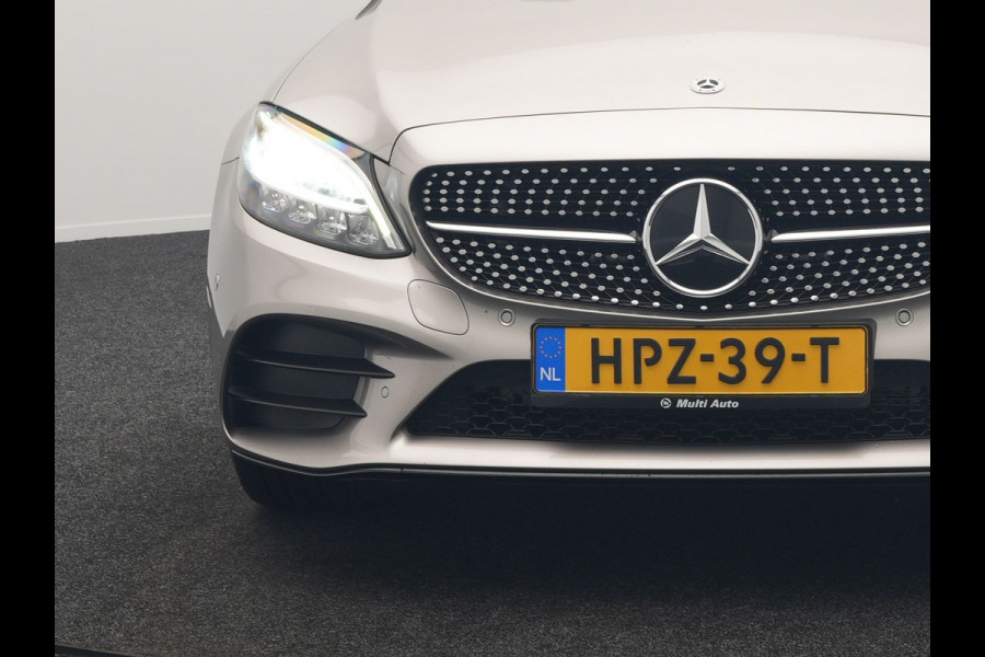 Mercedes-Benz C-Klasse Estate 300 e Business Solution AMG Plug In Hybrid 320pk PHEV | Trekhaak af Fabriek | Adaptive Cruise | Alcantara Sportstoelen Verwarmd | Apple Carplay | Camera | BLIS | 18"L.M |
