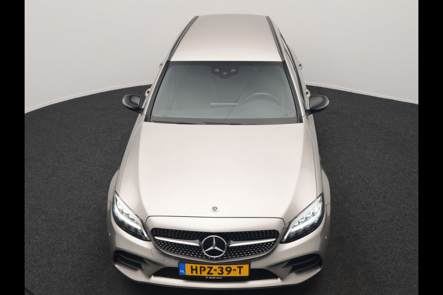 Mercedes-Benz C-Klasse Estate 300 e Business Solution AMG Plug In Hybrid 320pk PHEV | Trekhaak af Fabriek | Adaptive Cruise | Alcantara Sportstoelen Verwarmd | Apple Carplay | Camera | BLIS | 18"L.M |