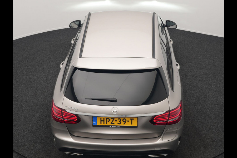 Mercedes-Benz C-Klasse Estate 300 e Business Solution AMG Plug In Hybrid 320pk PHEV | Trekhaak af Fabriek | Adaptive Cruise | Alcantara Sportstoelen Verwarmd | Apple Carplay | Camera | BLIS | 18"L.M |