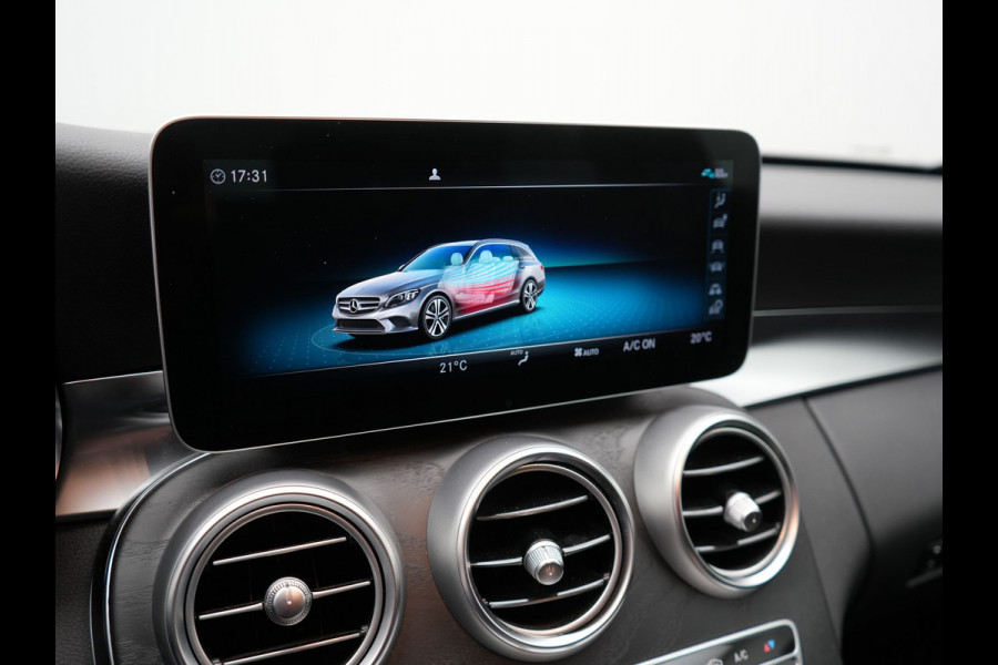 Mercedes-Benz C-Klasse Estate 300 e Business Solution AMG Plug In Hybrid 320pk PHEV | Trekhaak af Fabriek | Adaptive Cruise | Alcantara Sportstoelen Verwarmd | Apple Carplay | Camera | BLIS | 18"L.M |