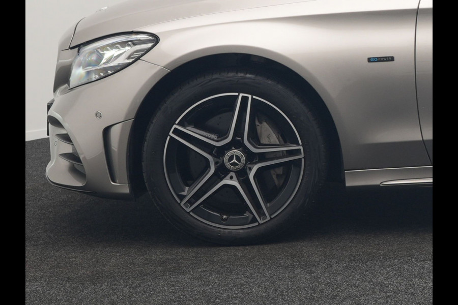 Mercedes-Benz C-Klasse Estate 300 e Business Solution AMG Plug In Hybrid 320pk PHEV | Trekhaak af Fabriek | Adaptive Cruise | Alcantara Sportstoelen Verwarmd | Apple Carplay | Camera | BLIS | 18"L.M |