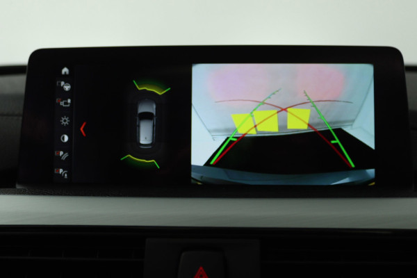 BMW 3 Serie Touring 320i Edition M Sport Shadow High Executive (PANORAMADAK, CAMERA, STOELVERWARMING, PARKEERSENSOREN)