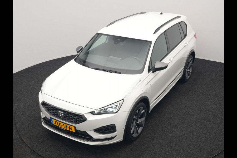 Seat Tarraco 1.4 TSI e-Hybrid FR Plug In Hybrid 245pk Dealer O.H. PHEV | Trekhaak Af Fabriek | Adaptive Cruise | 360 Camera | Alcantara Sportstoelen Memory & Verwarmd | Sfeerverlichting | Stuur Verwarmd | Keyless | Apple Carplay | Navigatie | DAB |