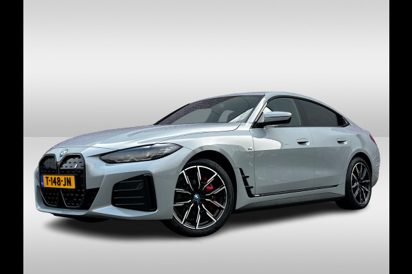 BMW i4 eDrive40 High Executive 84 kWh / Trekhaak / 360Camera / Head-up / Leder / 19'' / Navigatie / Stoelverwarming / DAB / Cruise Control