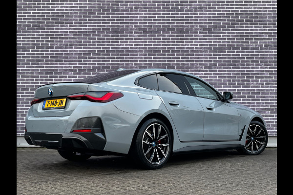 BMW i4 eDrive40 High Executive 84 kWh / Trekhaak / 360Camera / Head-up / Leder / 19'' / Navigatie / Stoelverwarming / DAB / Cruise Control
