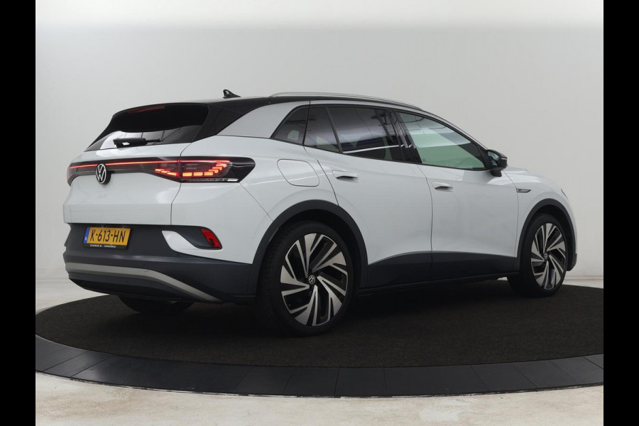 Volkswagen ID.4 First Max 77 kWh | Panoramadak | Head-Up | 360 Camera | Stoelverwarming | Matrix LED | Sfeerverlichting | Keyless | Adaptive cruise | Navigatie | Carplay | Half leder | Memory