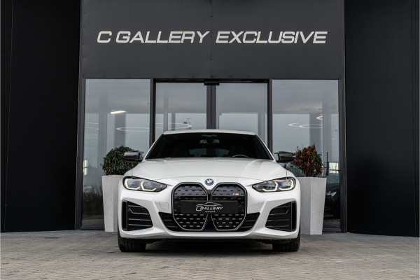 BMW i4 M50 High Executive M-Sport l Panorama l HUD l 360 camera l sportstoelen