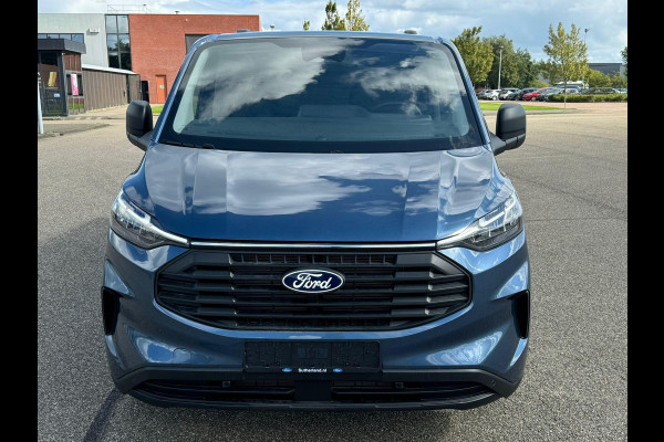 Ford Transit Custom 320 2.0 TDCI L2H1 Trend | Automaat 136pk | SCI | Adaptive cruise control | | 8-weg bestuurderstoel + passagiersbank | Stoelverwarming | Dodehoeksensoren | Navigatie | Elektrisch inklapbare spiegels | 16 inch lichtmetalen velgen | Full LED | Dual-zone climate control | LED laadruimteverlichting
