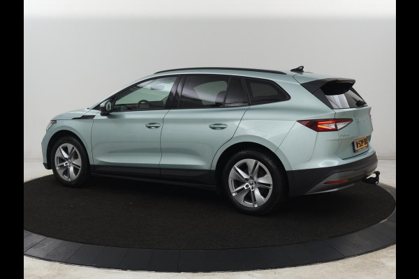 Škoda ENYAQ iV 60 | SOH 91% | Trekhaak | Stoelverwarming | Camera | Sportstuur | Carplay | Navigatie | Cruise control | Full LED | Half leder | DAB | Parkeerhulp | Sfeerverlichting | Climate control