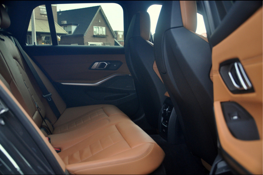 BMW 3 Serie Touring M340i xDrive Business Edition | Panoramadak | Laser | HUD | HK Audio | Zeer mooie staat!