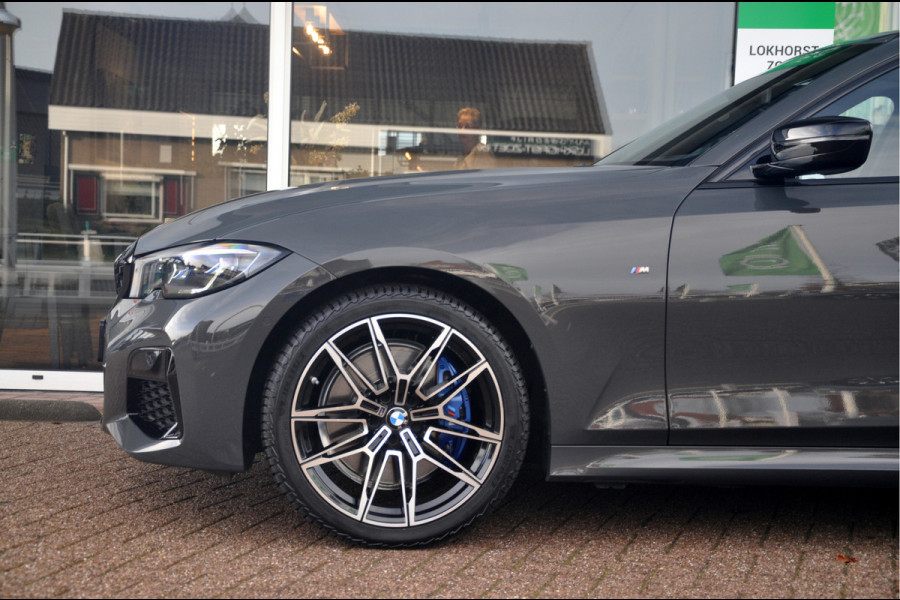 BMW 3 Serie Touring M340i xDrive Business Edition | Panoramadak | Laser | HUD | HK Audio | Zeer mooie staat!