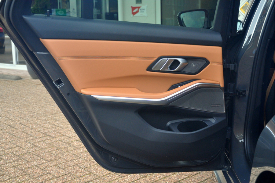 BMW 3 Serie Touring M340i xDrive Business Edition | Panoramadak | Laser | HUD | HK Audio | Zeer mooie staat!