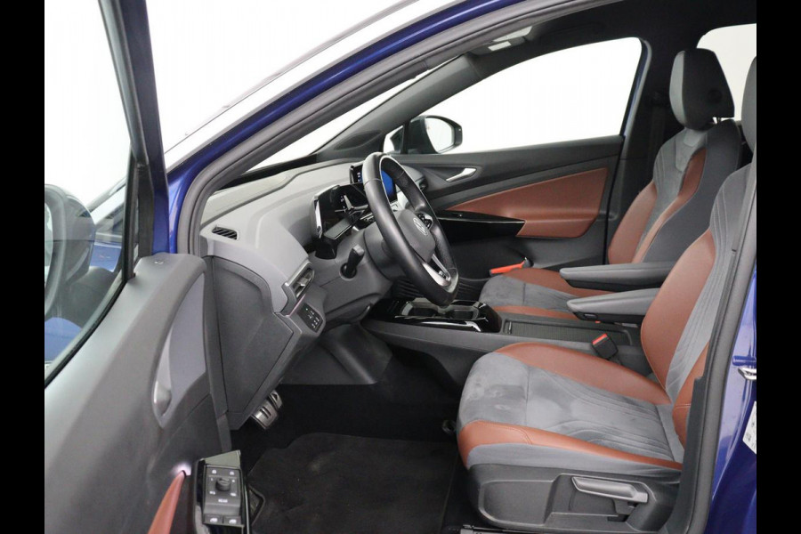 Volkswagen ID.4 First 77 kWh | SOH 90% | Stoel & stuurverwarming | Adaptive cruise | Camera | Carplay | Half leder | Navigatie | 20'' | Full LED | Keyless | Climate control | Sfeerverlichting