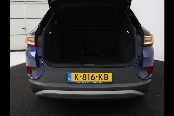 Volkswagen ID.4 First 77 kWh | SOH 90% | Stoel & stuurverwarming | Adaptive cruise | Camera | Carplay | Half leder | Navigatie | 20'' | Full LED | Keyless | Climate control | Sfeerverlichting
