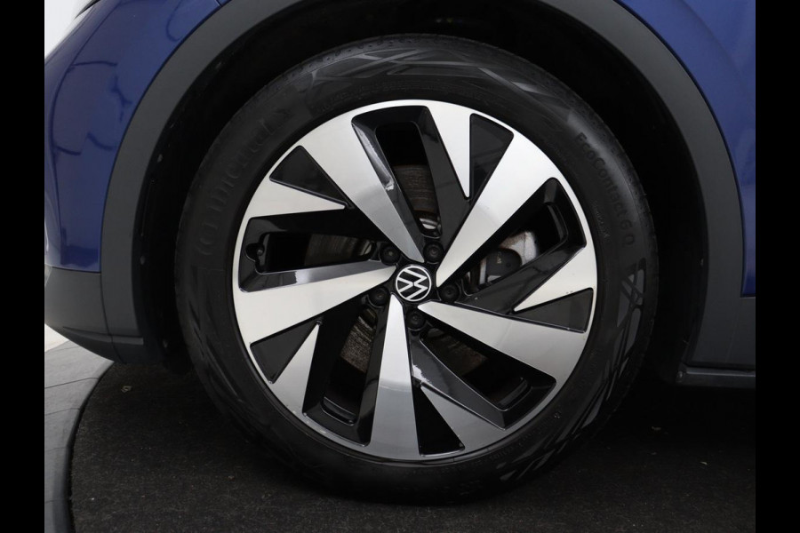 Volkswagen ID.4 First 77 kWh | SOH 90% | Stoel & stuurverwarming | Adaptive cruise | Camera | Carplay | Half leder | Navigatie | 20'' | Full LED | Keyless | Climate control | Sfeerverlichting